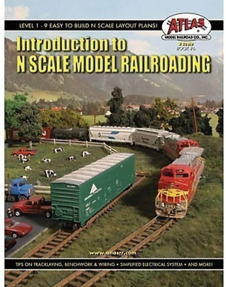 Atlas Model Railroad N Scale Model Railroading book cover with train illustrations and detailed layout examples.