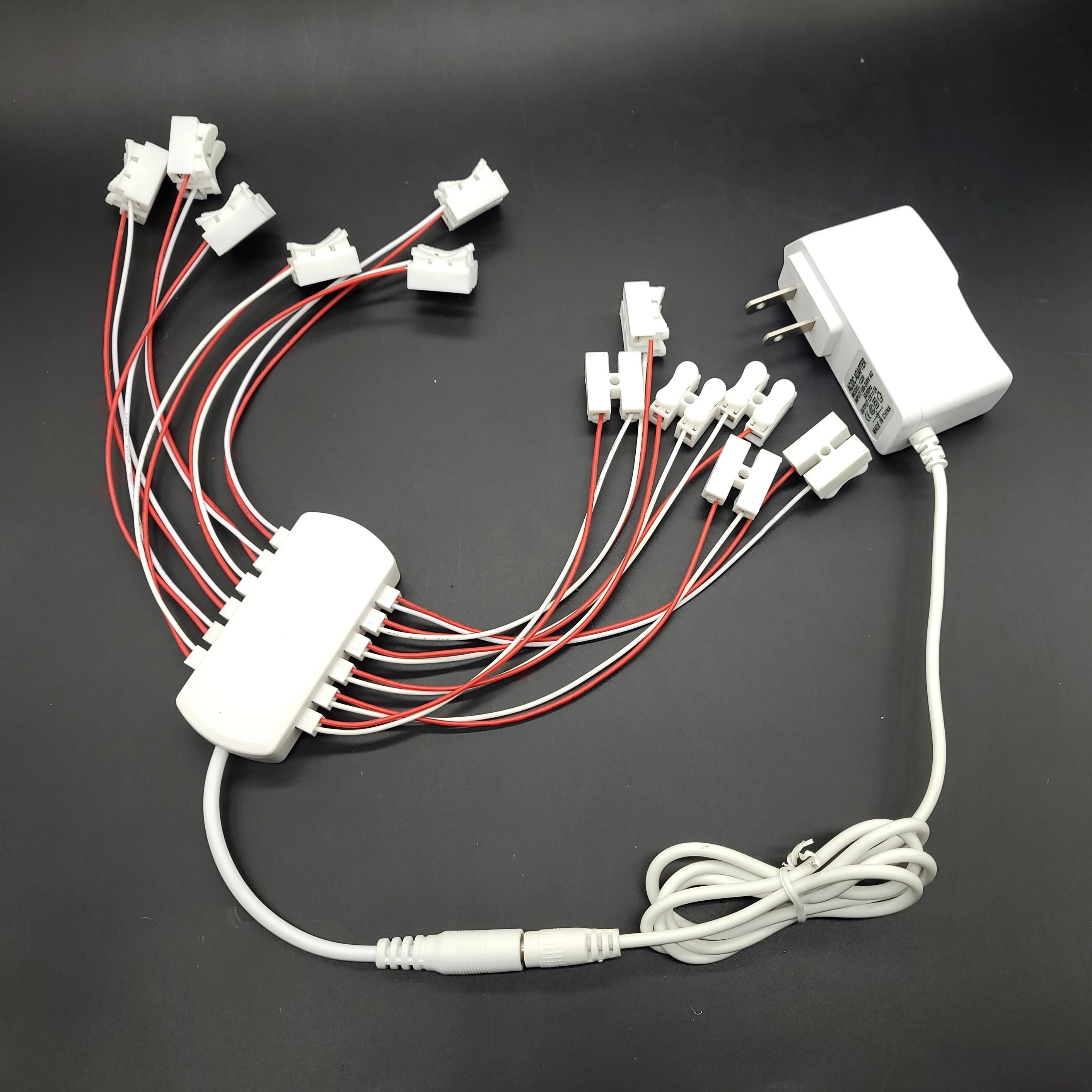 12-Port Universal AC/DC Power Supply Adapter for 3V/12V Applications - Ideal for Model Lamps, Railway, and Train Layouts