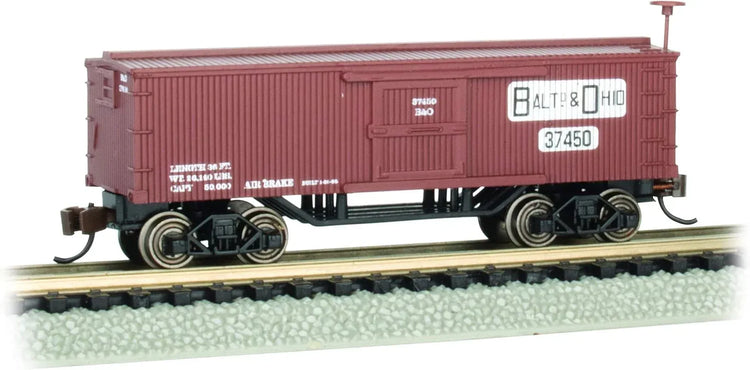 Bachmann Trains Old-Time Box Car in B&O® N Scale model with detailed vintage design on a model train track.