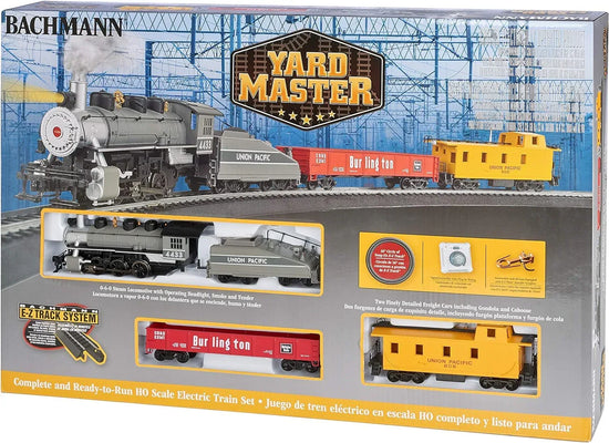 Bachmann Yard Master HO Scale electric train set with locomotive, cars, and track for model train enthusiasts.