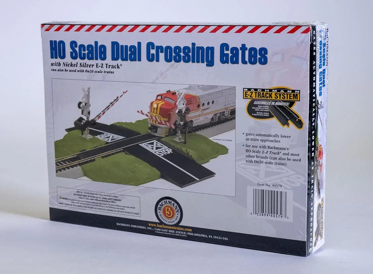 HO scale Bachmann Trains E-Z Track crossing gate, medium size, with detailed rail and gate components visible.