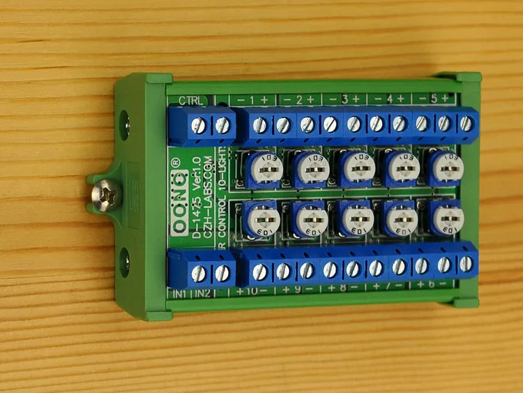 CZH-LABS 10-Lights LED dimmer control hub for HO and N scale train sets, featuring multiple LED lights for model train lighting.