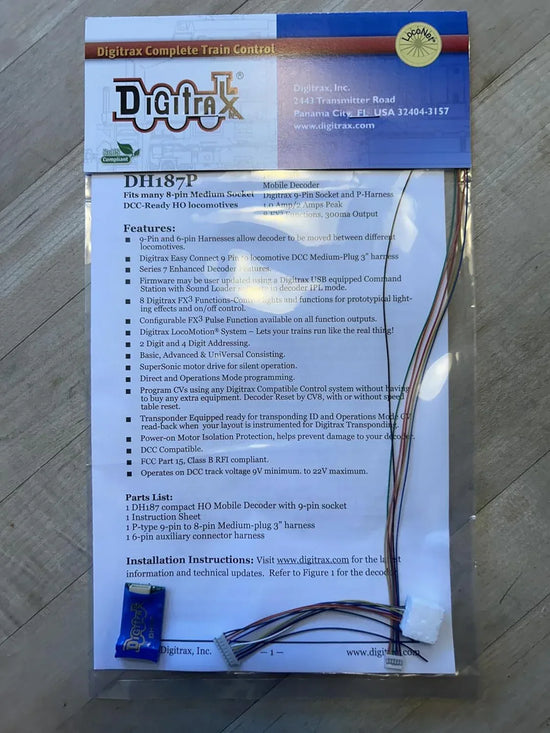 HO scale Digitrax DH187P digital decoder module for model trains, featuring easy installation and advanced control features.