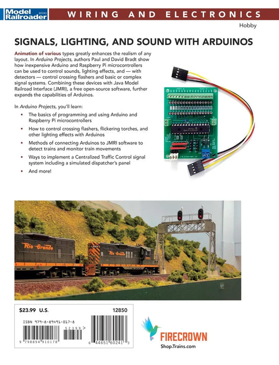 Open Arduino Project Development Handbook showing pages with diagrams and code for electronics and programming projects.