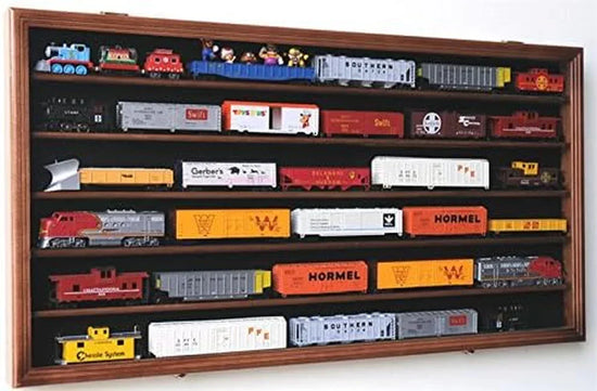 Walnut wall-mounted lockable display cabinet for HO scale model trains with UV protection, showcasing model trains inside.
