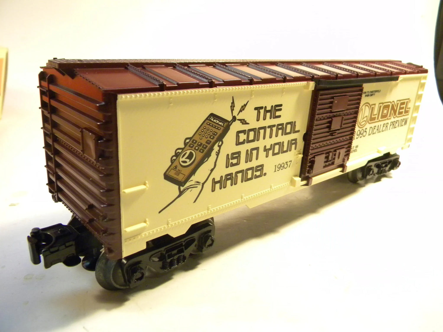 Mint condition 1995 Toy Fair Box Car by BYMRR Train Store in original packaging, detailed model with colorful design.