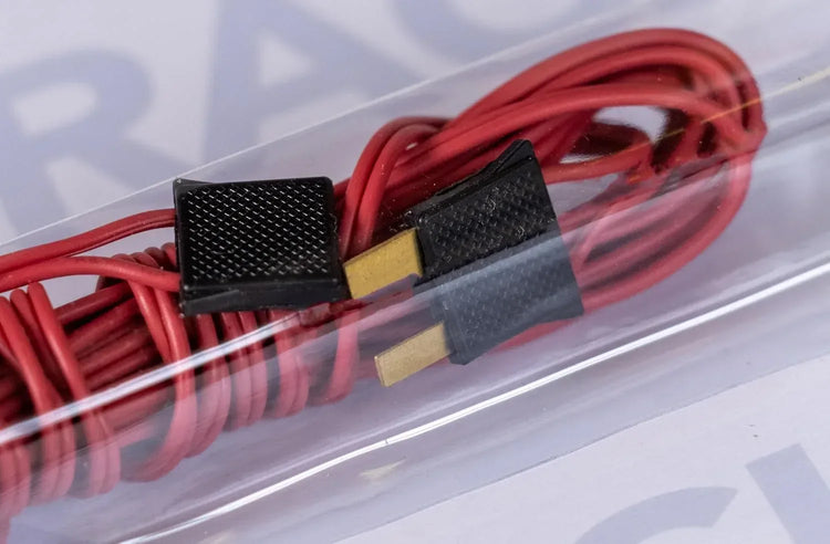 Red Bachmann Trains E-Z Track 10-foot power extension wire for model train layouts, designed for easy electrical connectivity.