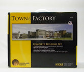 N scale Woodland Scenics town and factory building set with detailed miniature structures for model train layouts.