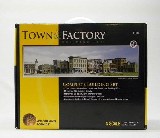 N scale Woodland Scenics town and factory building set with detailed miniature structures for model train layouts.