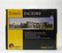 N scale Woodland Scenics town and factory building set with detailed miniature structures for model train layouts.