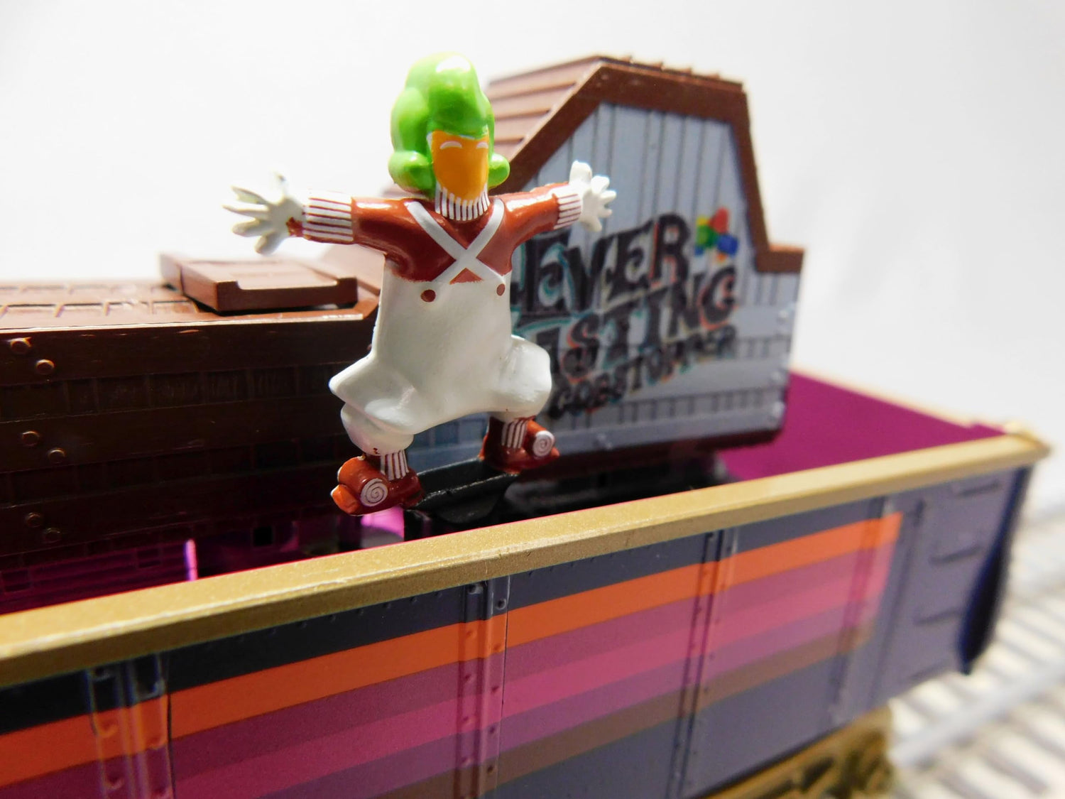 Oompa Loompa Gondola toy from Willy Wonka & the Chocolate Factory model, featuring colorful Oompa Loompa figures and a gondola design.