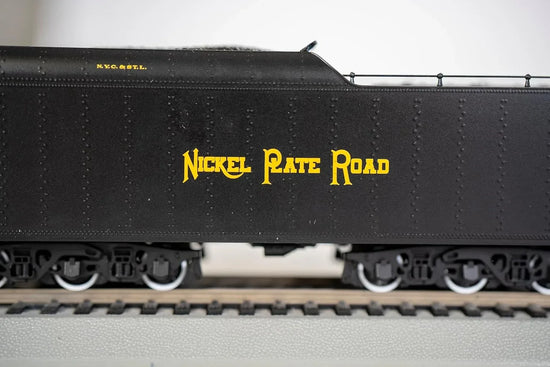 HO Bachmann Industries Inc. 2-8-4 Berkshire steam locomotive with DCC sound system, detailed model on display.