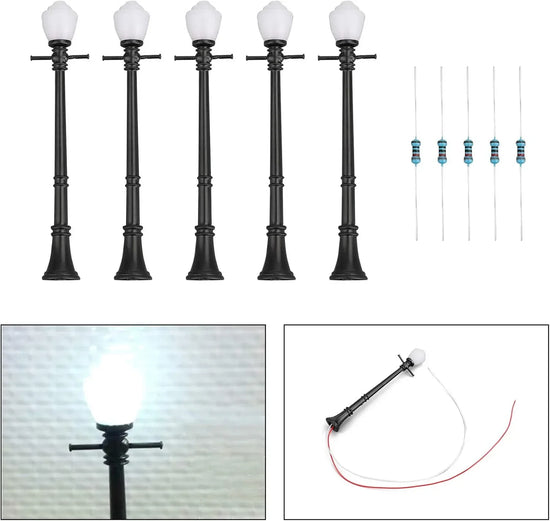Artudatech 10-piece LCX04 model railway lamppost street light set with O scale LEDs displayed on a model train layout.