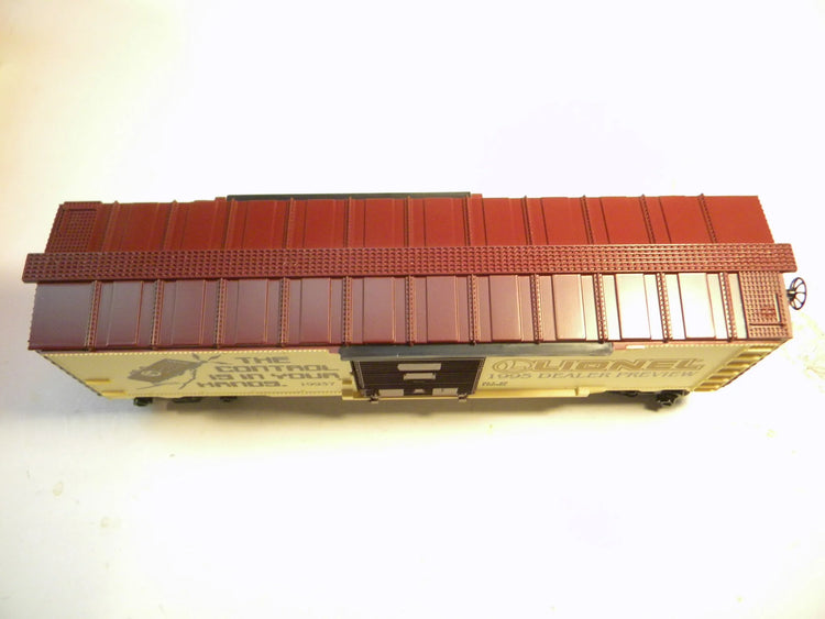 Mint condition BYMRR Toy Fair Box Car 1995 in original packaging, detailed model with vibrant colors and vintage design.