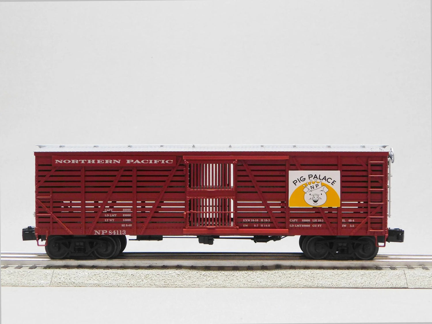 O gauge VISIONLINE Northern Pacific stock car 3-pack model by BYMRR Train Store, detailed train car set with colorful paint.
