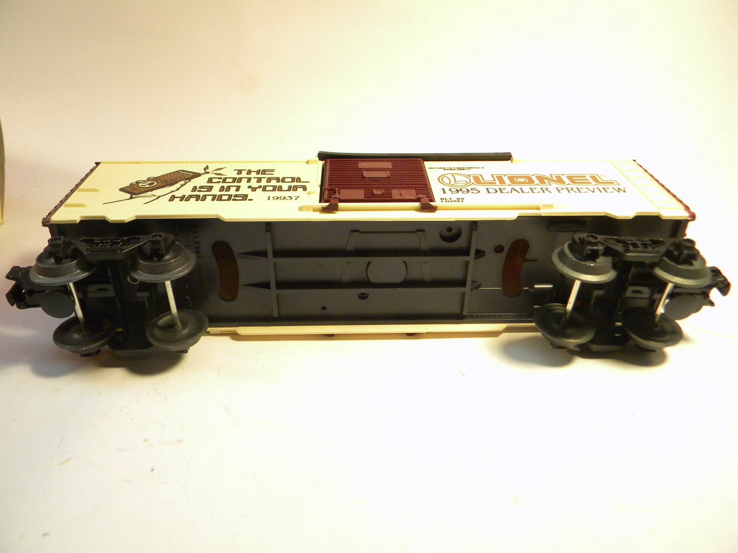 Mint condition 1995 Toy Fair box car by BYMRR Train Store in original packaging, detailed view of vintage model train car.