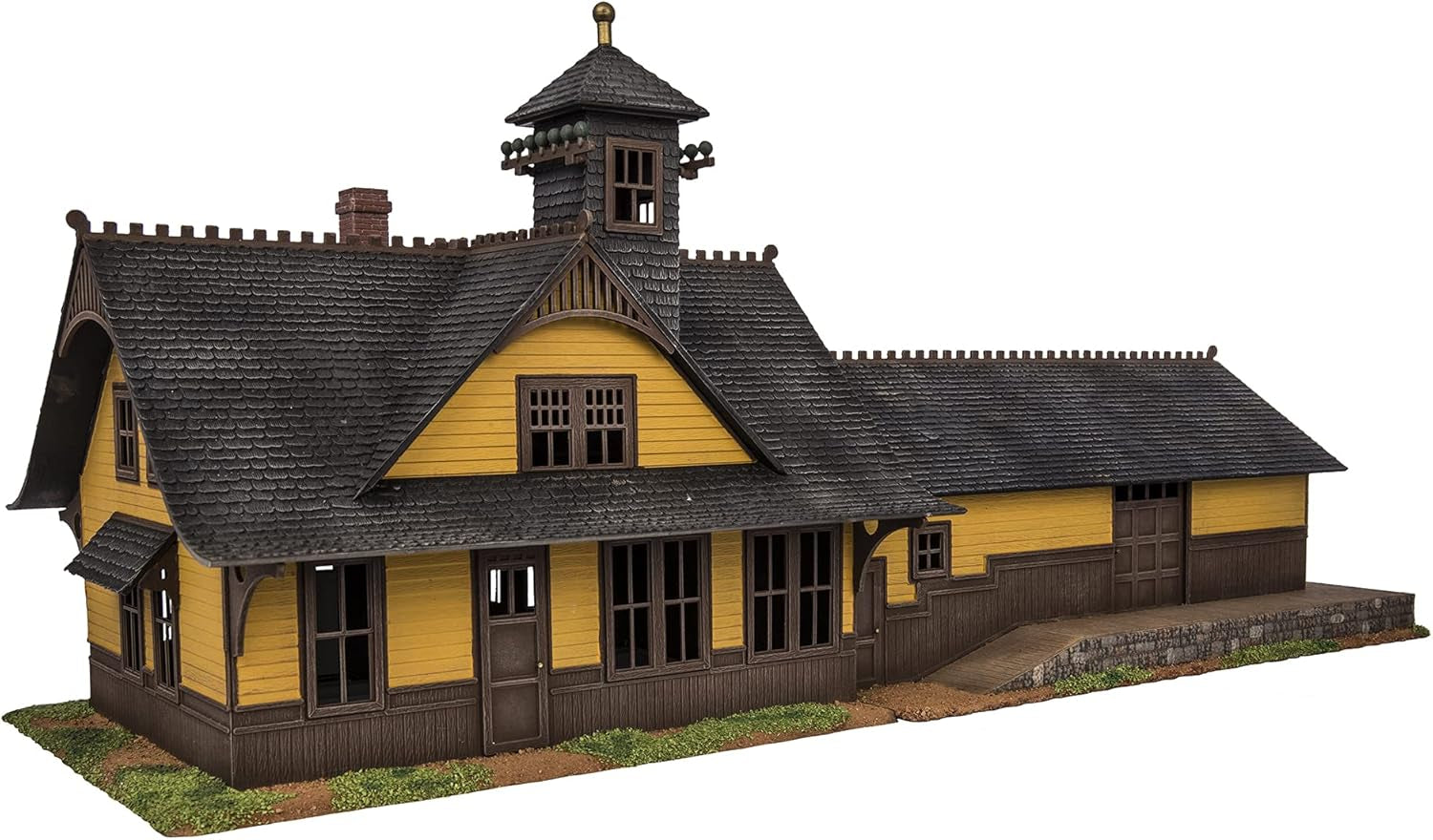 Lionel Rico Rocky Mountain Passenger Train Station model kit with detailed miniature station building and scenic surroundings.