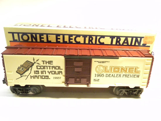 Mint condition BYMRR Train Store 1995 Toy Fair box car in original packaging, detailed view of collectible model train accessory.