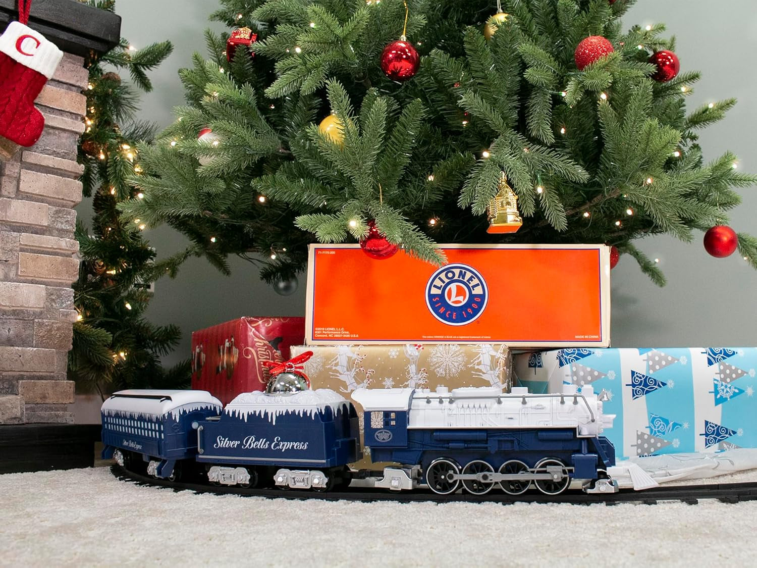 Lionel Silver Bells Express Battery-Operated Toy Train Set with Locomotive, Cars, Track, Remote Control, Authentic Sounds, and Lights for Children Ages 4 and Up