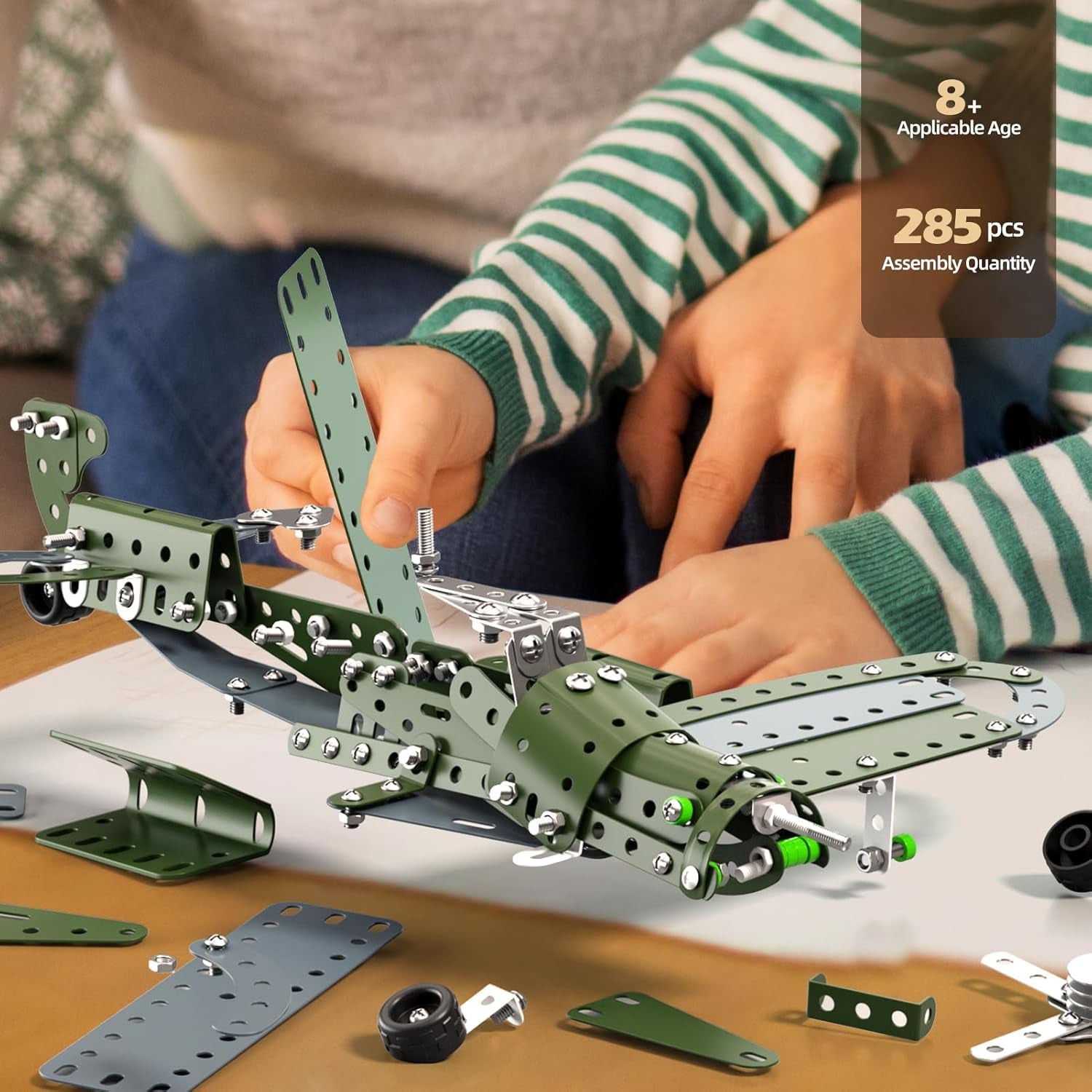 WATUDOU STEM model airplane kit for kids ages 8-12, featuring colorful parts and assembled airplane for creative building and play.
