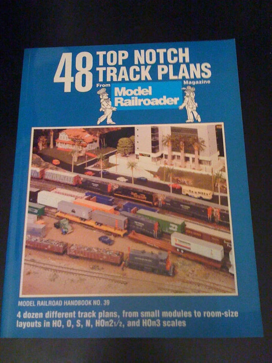 Book cover of "48 Exceptional Track Plans" from Model Railroader Magazine, showcasing model train track layouts and plans.