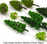 Set of 70 miniature artificial trees for train scenery and diorama landscaping, ideal for model railroads and wargame terrain.