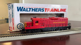 Pre-owned Walthers HO US Army GP9M locomotive model by BYMRR Train Store, showing detailed exterior and military paint scheme.