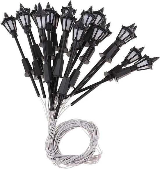 Amagogo 20-piece 1/100 scale HO miniature LED street lights for railway and garden diorama scenes, showing detailed tiny street lighting.