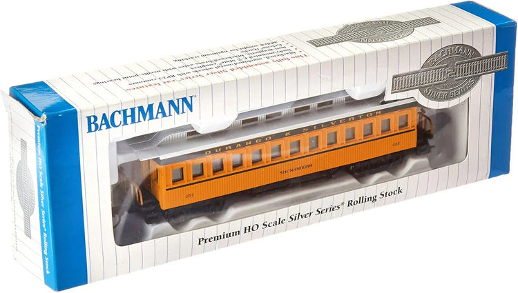 Bachmann yellow passenger car for model railroads, detailed prototype design with windows and realistic features