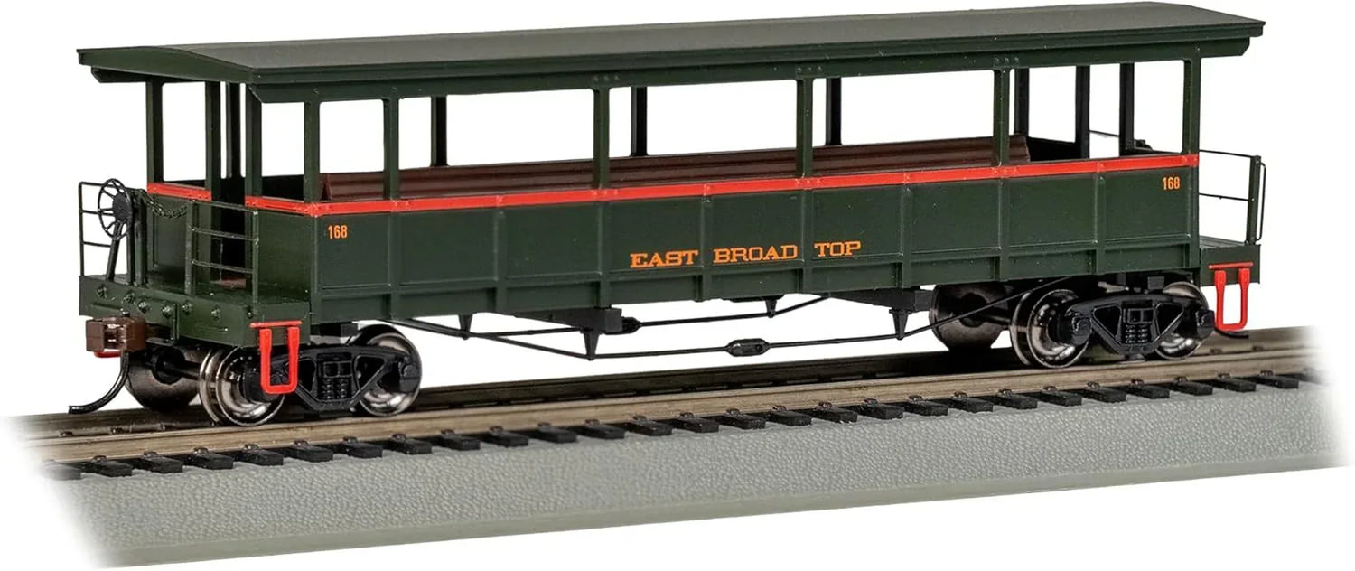 HO scale Bachmann East Broad Top open-sided excursion train car with detailed exterior and open windows.