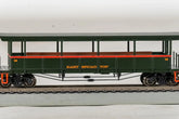HO scale Bachmann East Broad Top open-sided excursion train car with detailed interior and vintage design.
