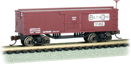 Bachmann Trains Old-Time Box Car in B&O® N Scale model with detailed vintage design on a model train track.