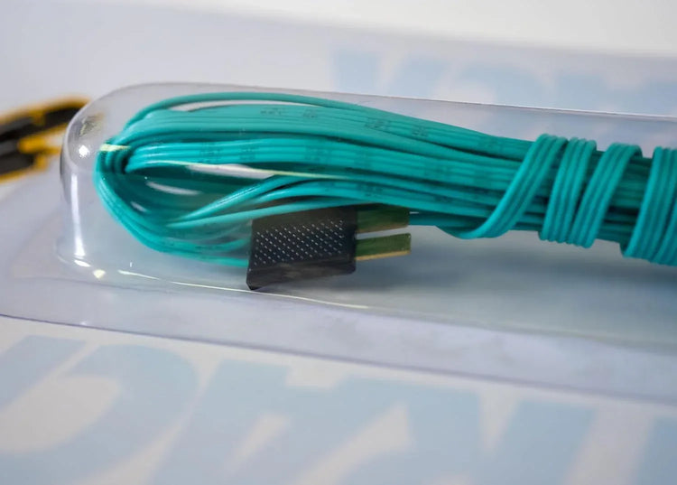 Green Bachmann Trains 10-foot remote switch extension wire for model railway control, shown on a card.