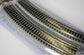 Bachmann Trains E-Z Track 18-inch radius curved track set with four nickel silver rail pieces and gray roadbed for HO scale model railroads.