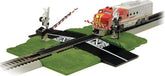 HO scale Bachmann Trains E-Z Track crossing gate with medium size, featuring realistic details and safety barriers for model train setups.