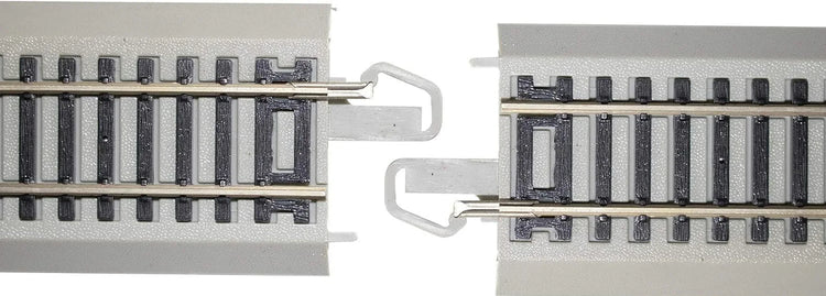 Set of four Bachmann Trains HO scale snap-fit E-Z Track 3-inch straight sections with nickel silver rails and gray roadbed.