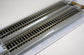 Bachmann Trains HO scale E-Z Track 9-inch straight track pack with nickel silver rails and gray roadbed, four-piece set.