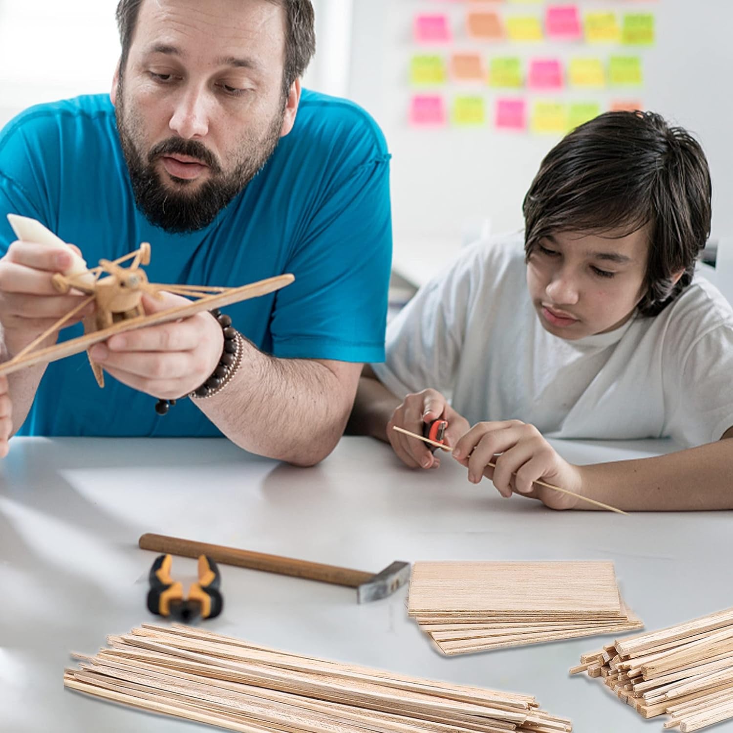 Peony Man balsa wood sticks and sheets for DIY crafts, model making, and creative projects, showing assembled wooden craft pieces.