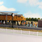Painted HO scale passenger figures by Evemodel showing seated and standing passengers for 1:87 model train accessories.