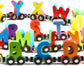 Magnetic wooden alphabet train set for toddlers with engine and letter cars, compatible with major brand train tracks.