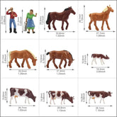 HO scale 1:87 model train farm set with horses, cows, figures, and farm buildings, featuring detailed miniature farm scene.