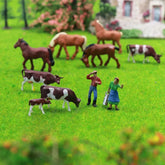 HO scale model train farm set with horses, cows, and figures in detailed 1:87 size by Evemodel for model train layouts.