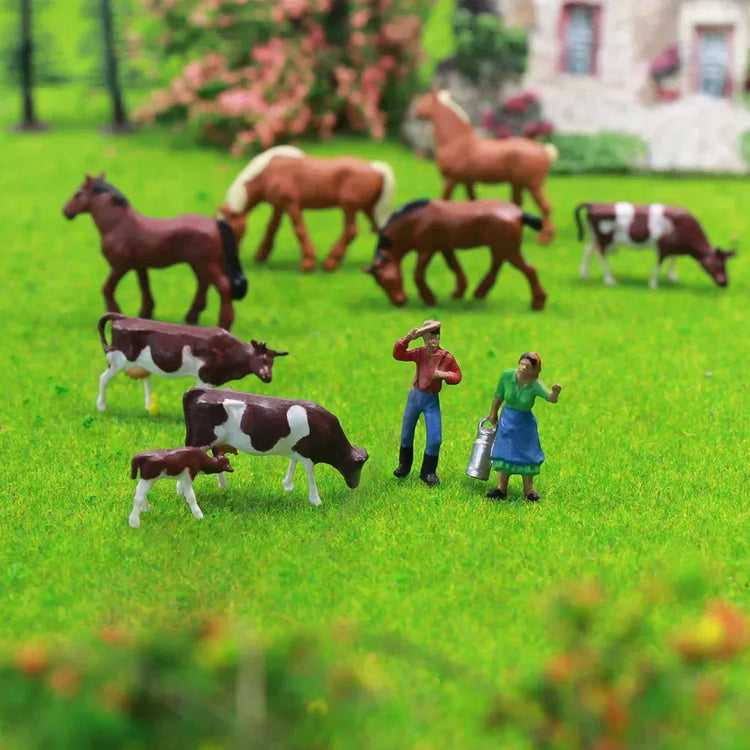 HO scale model train farm set with horses, cows, and figures in detailed 1:87 size by Evemodel for model train layouts.