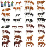 HO scale model train farm set with horses, cows, and figures, featuring detailed miniature farm accessories and livestock.