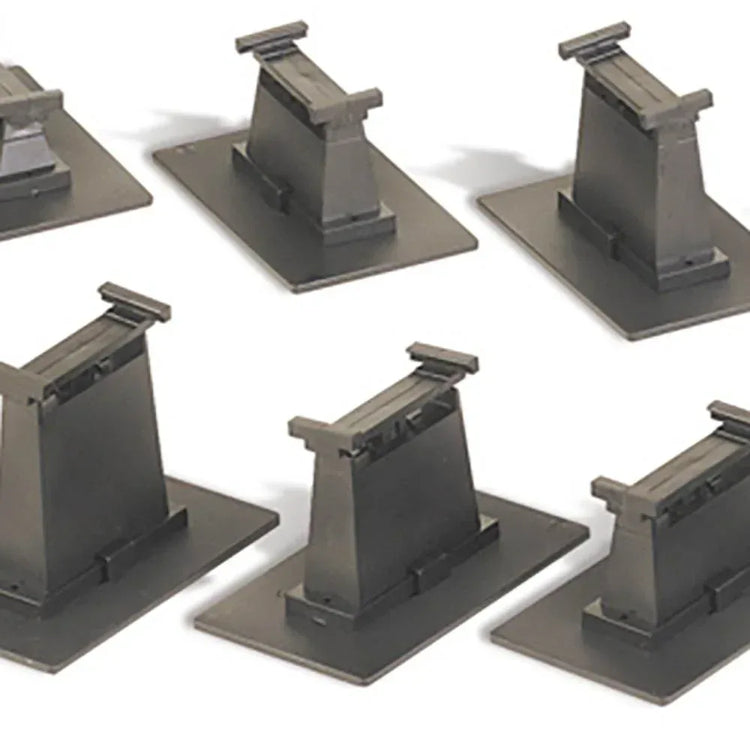 HO scale 14-piece E-Z Track graduated pier set for model railroads, featuring realistic concrete piers and track support structures.