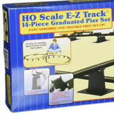 HO scale 14-piece E-Z Track graduated pier set for model railroads, featuring detailed concrete pier structures.
