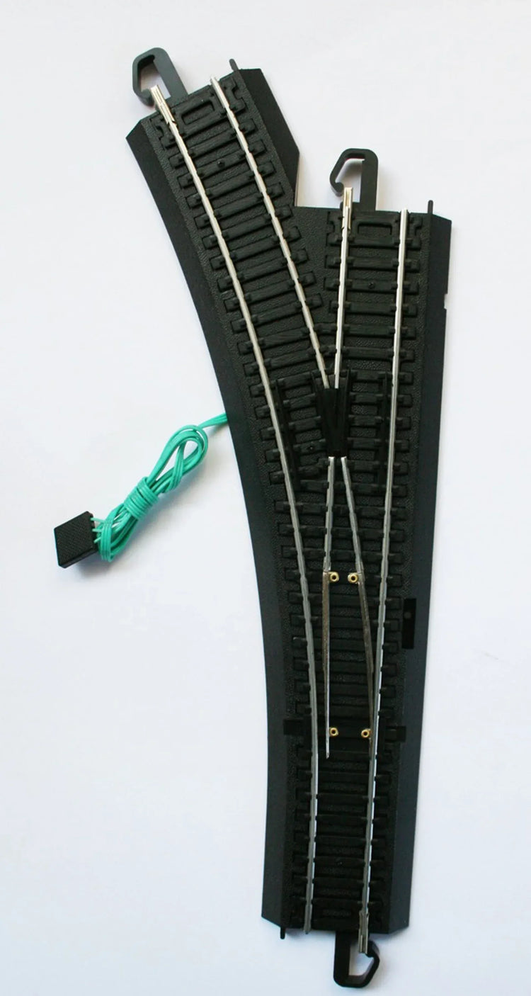 HO scale left-hand remote turnout track accessory for model trains, by BYMRR Train Store, with a single track switch accessory.