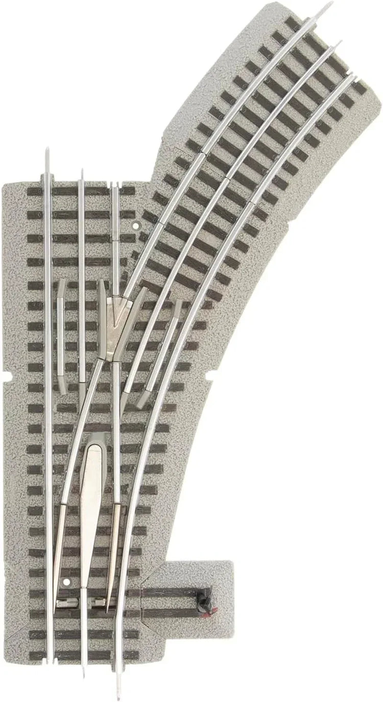 Fastrack O Gauge 036 electric left-hand manual switch for model train tracks, suitable for ages 14 and up.