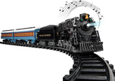 Polar Express Berkshire-style battery-operated model train set with remote control, featuring detailed train cars and festive holiday design.