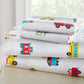 Soft cotton flannel sheet set with trains, planes, and trucks design, cozy and comfortable bedding for children.